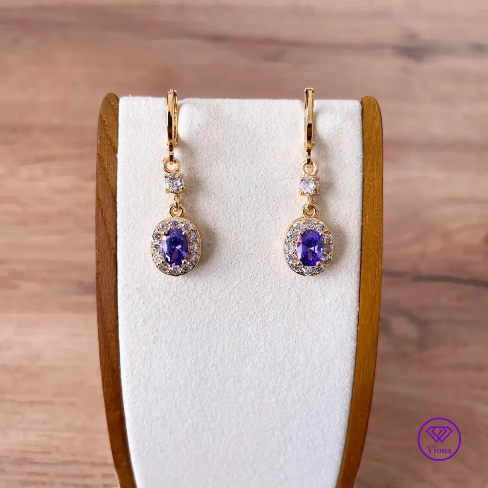 18K gold filled oval earrings with main amethyst purple cubic zirconia stone and small white CZ decoration