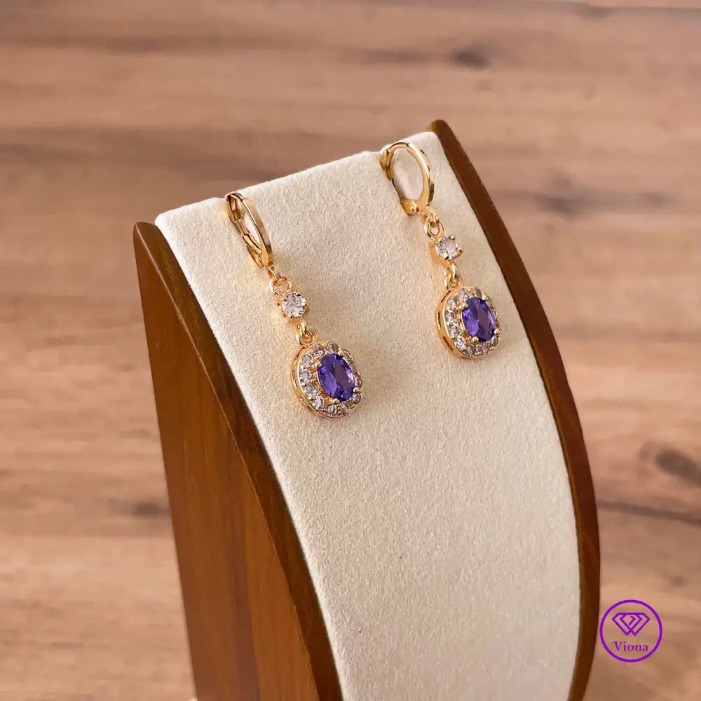 18K gold filled oval earrings with main amethyst purple cubic zirconia stone and small white CZ decoration