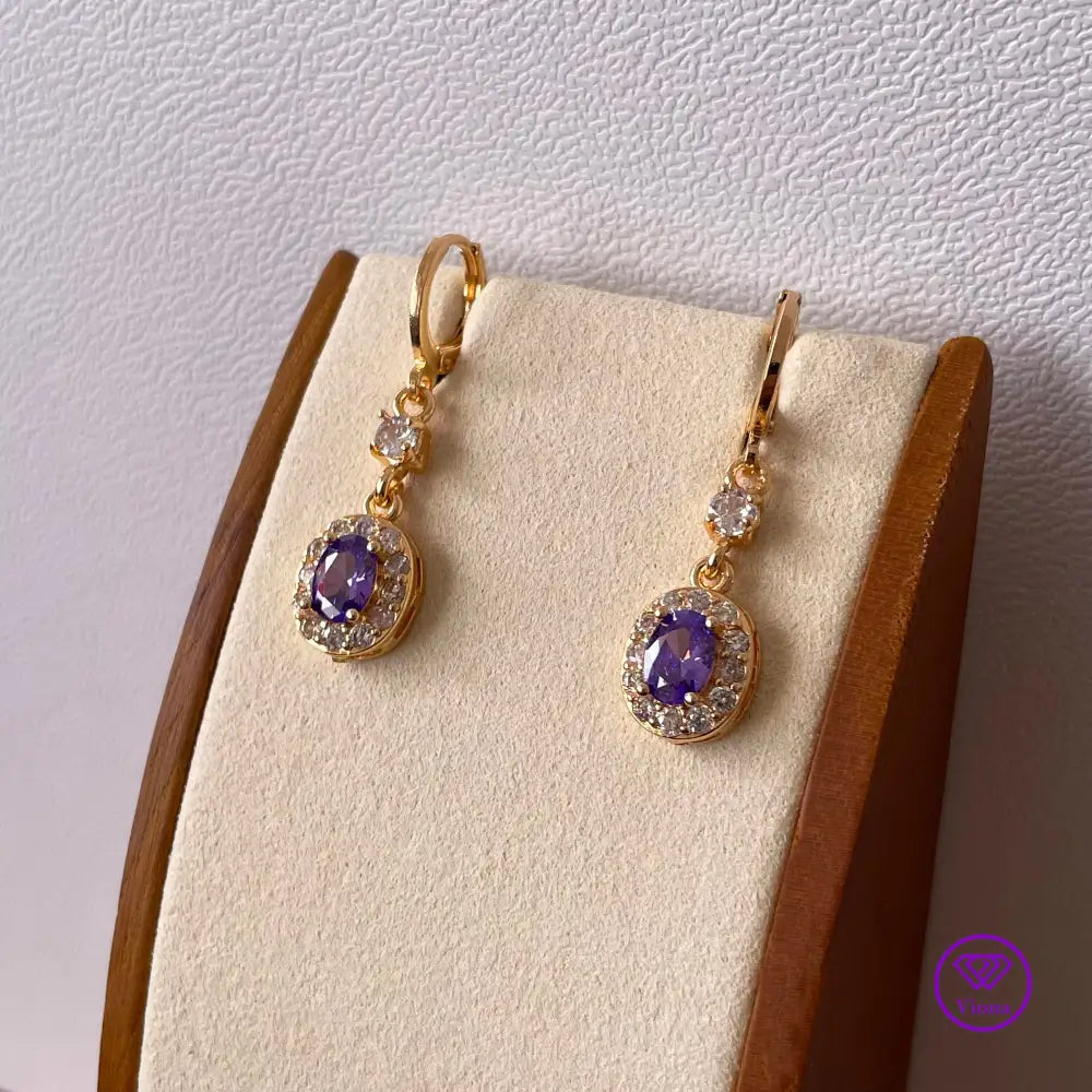 18K gold filled oval earrings with main amethyst purple cubic zirconia stone and small white CZ decoration