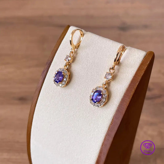 18K gold filled oval earrings with main amethyst purple cubic zirconia stone and small white CZ decoration