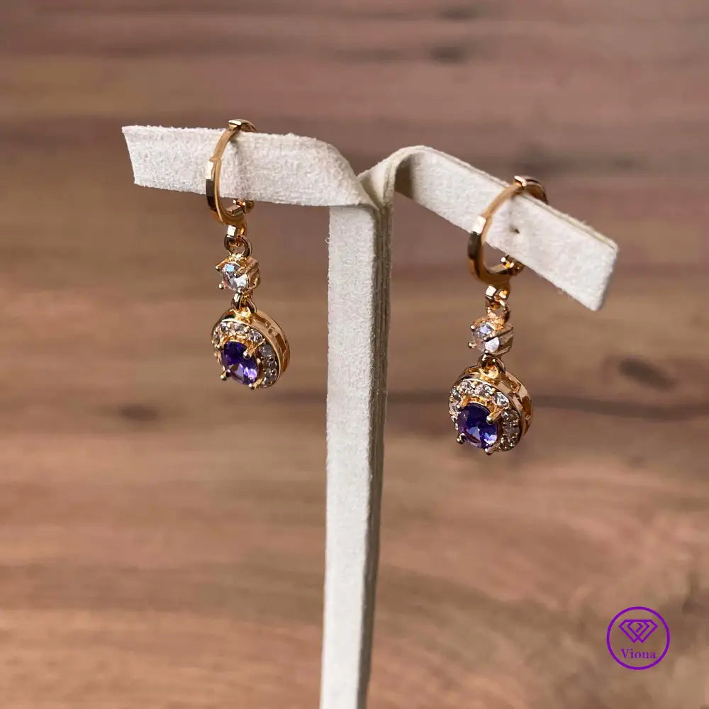 18K gold filled oval earrings with main amethyst purple cubic zirconia stone and small white CZ decoration