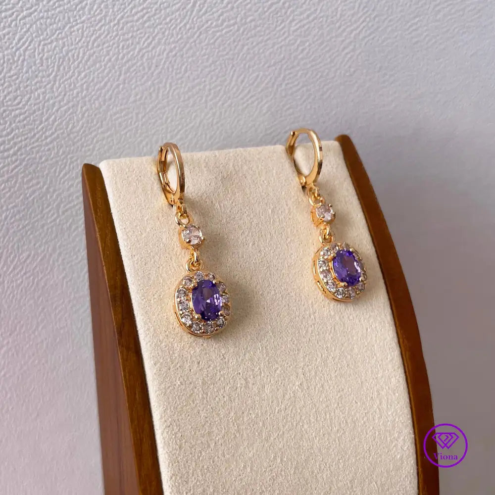 18K gold filled oval earrings with main amethyst purple cubic zirconia stone and small white CZ decoration