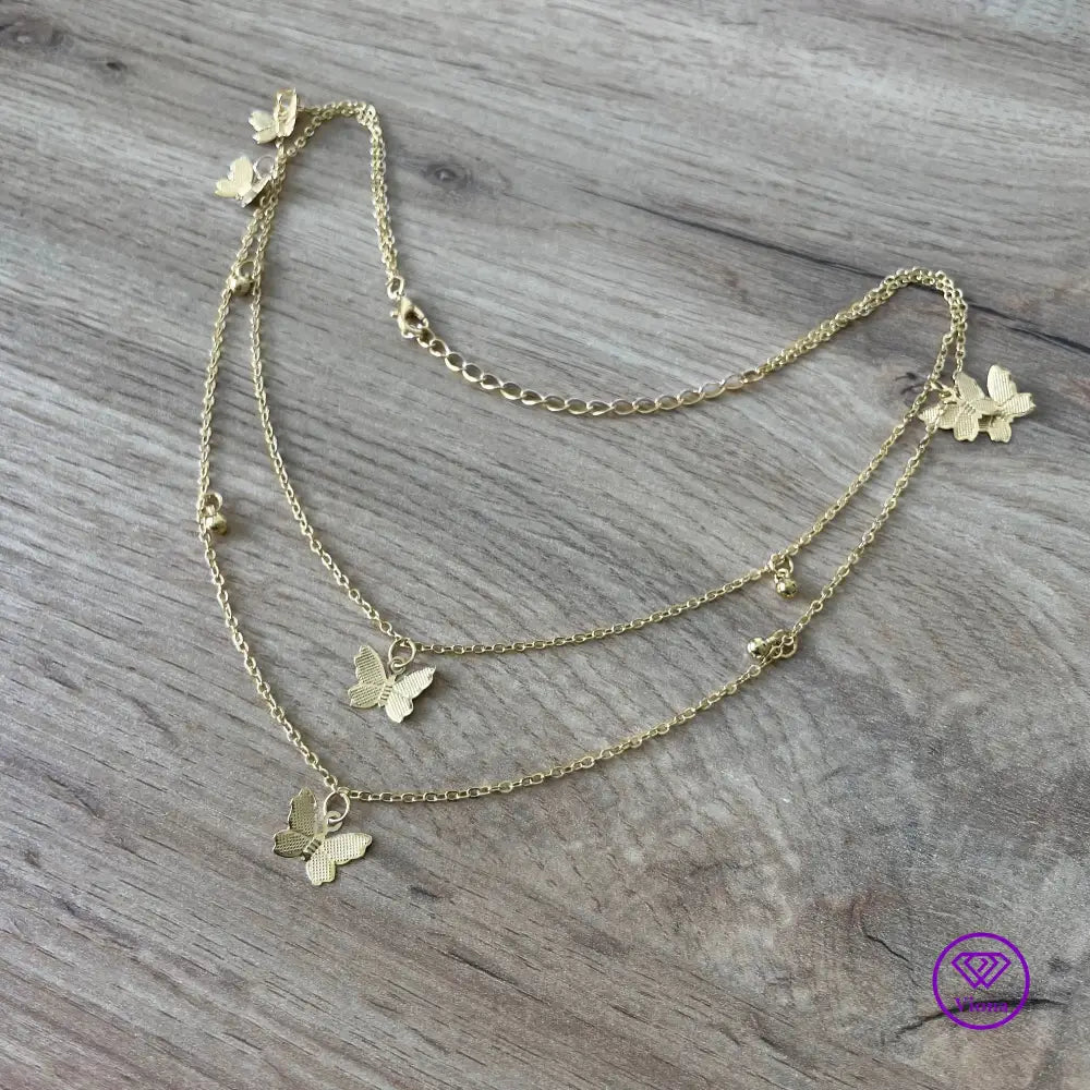 Double layered butterfly necklace in gold color and adjustable chain