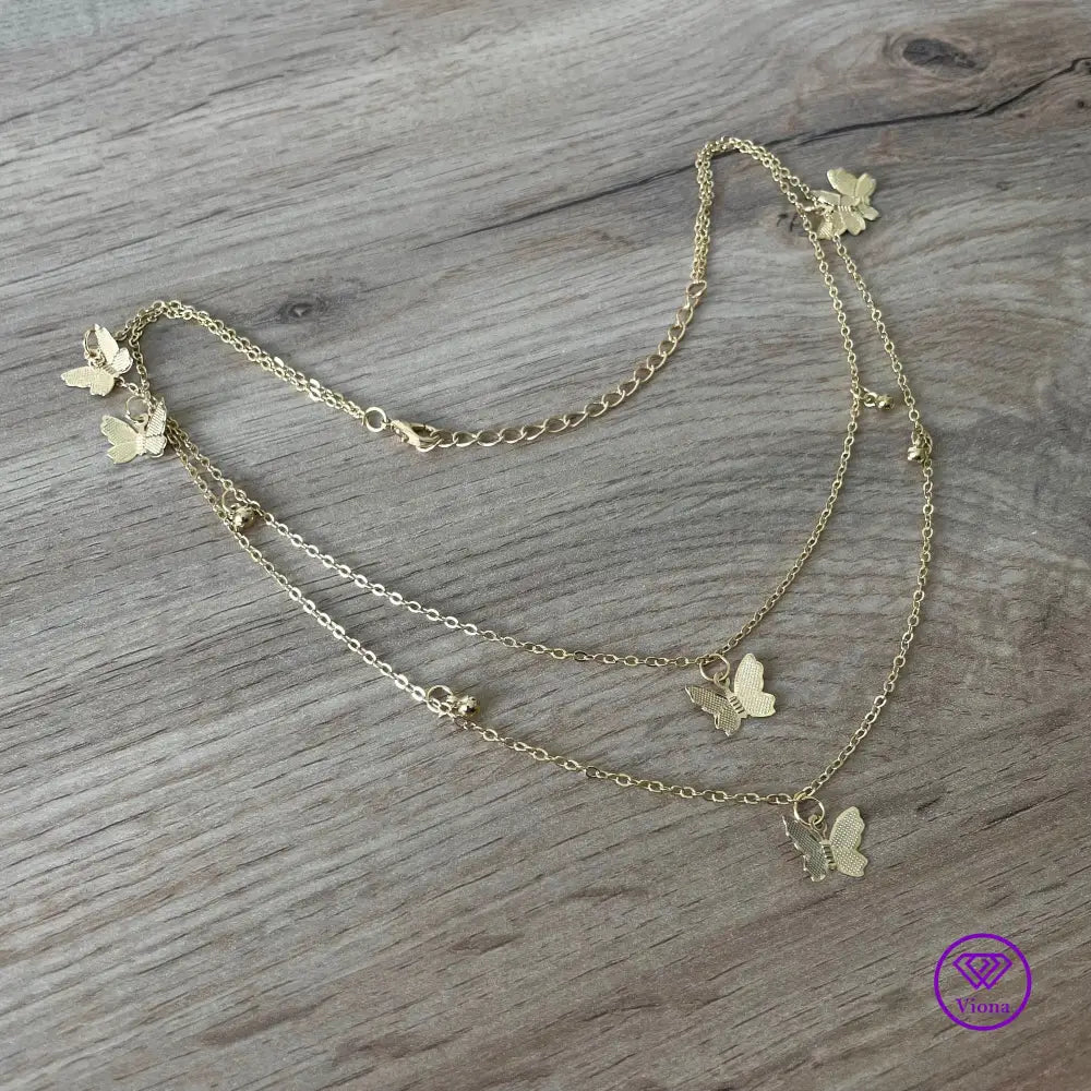 Double layered butterfly necklace in gold color and adjustable chain