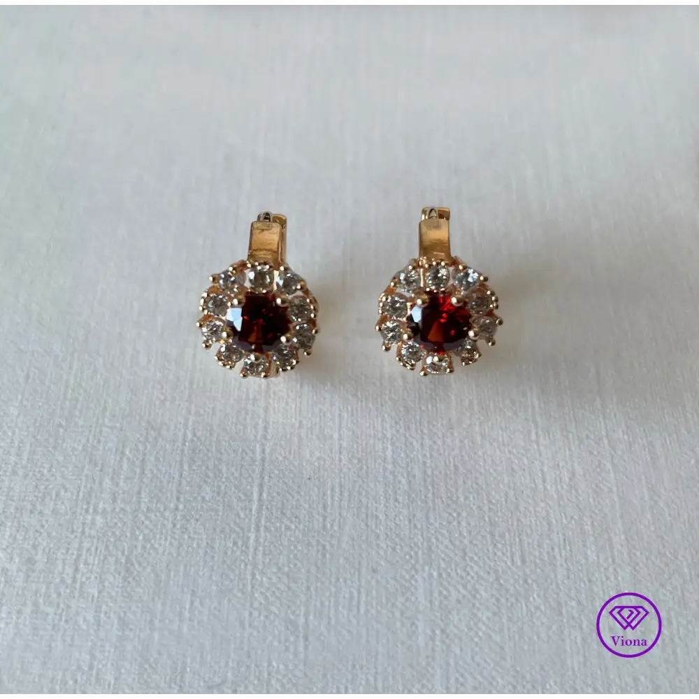 Gold-Filled Earrings with round ruby red Cubic Zirconia main stone and 10 white topaz