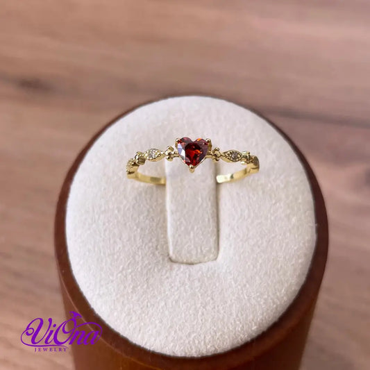 Gold Plated 925 Sterling silver ruby red heart ring with decorated topaz