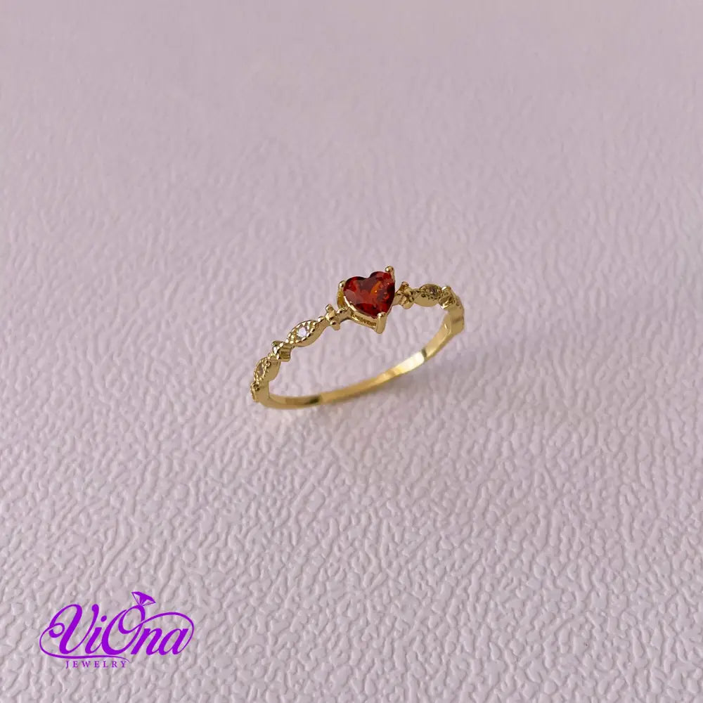 Gold Plated 925 Sterling silver ruby red heart ring with decorated topaz