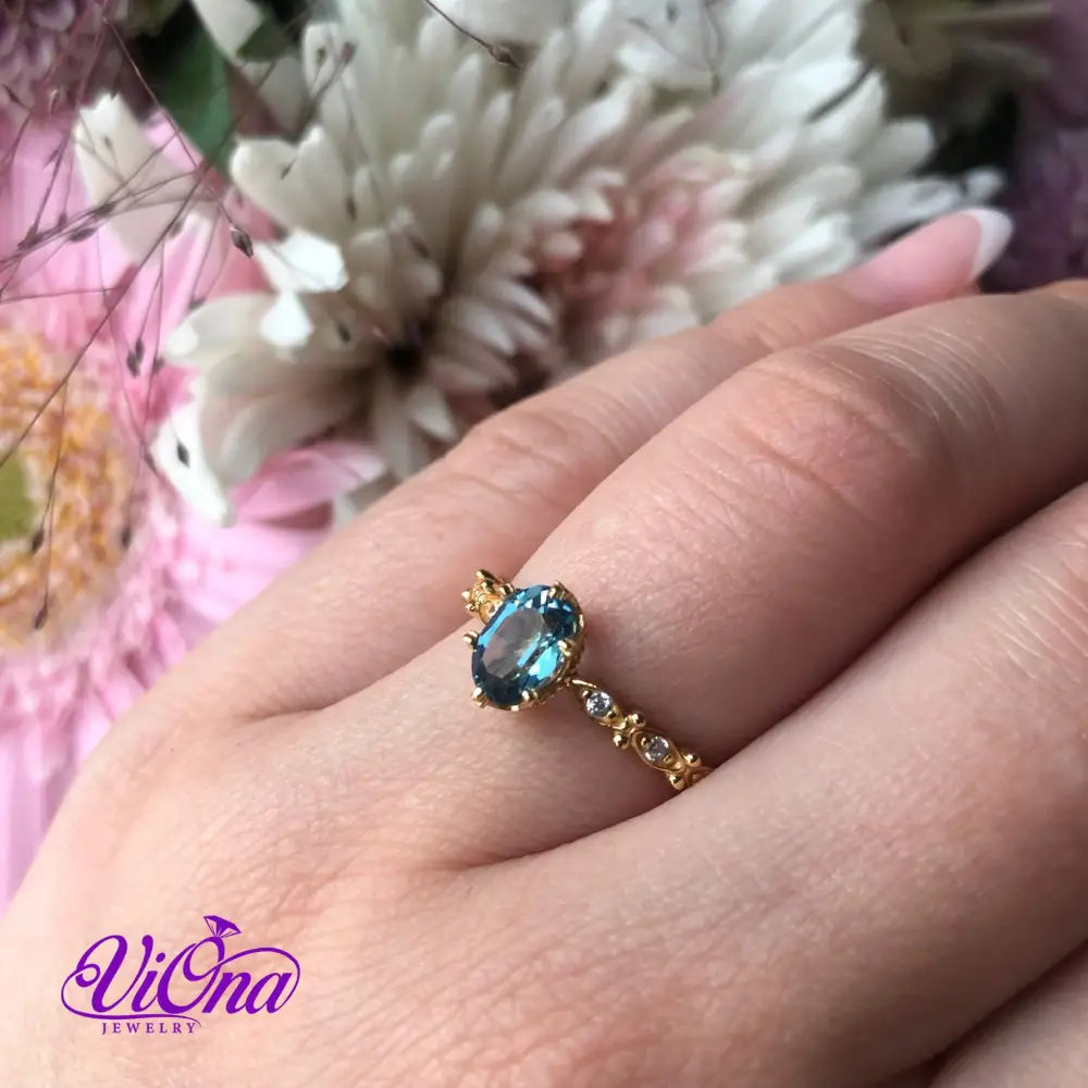 Natural blue topaz gemstone ring with gold plated sterling silver, 925 Stamped