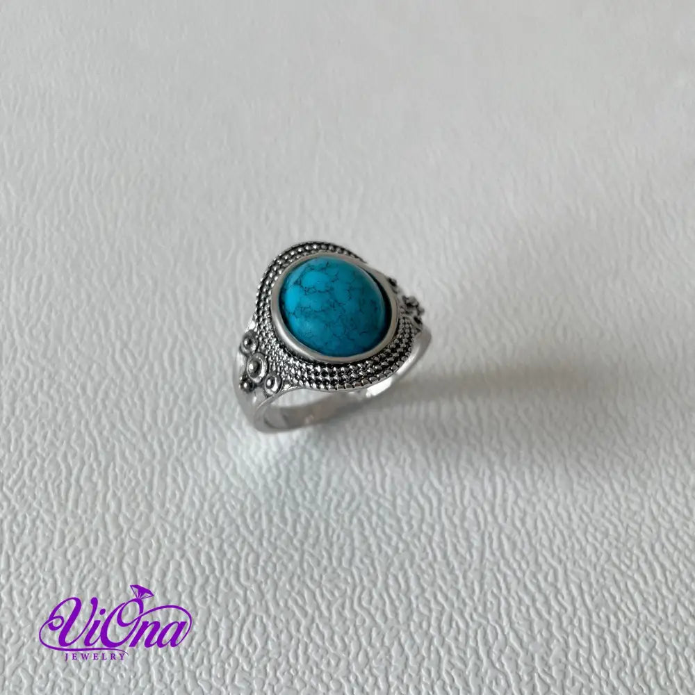 Natural stone turquoise ring with engraved 925 sterling silver