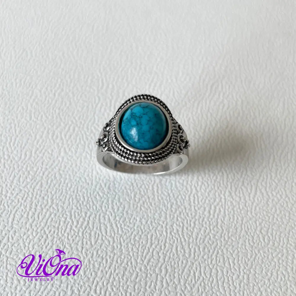 Natural stone turquoise ring with engraved 925 sterling silver