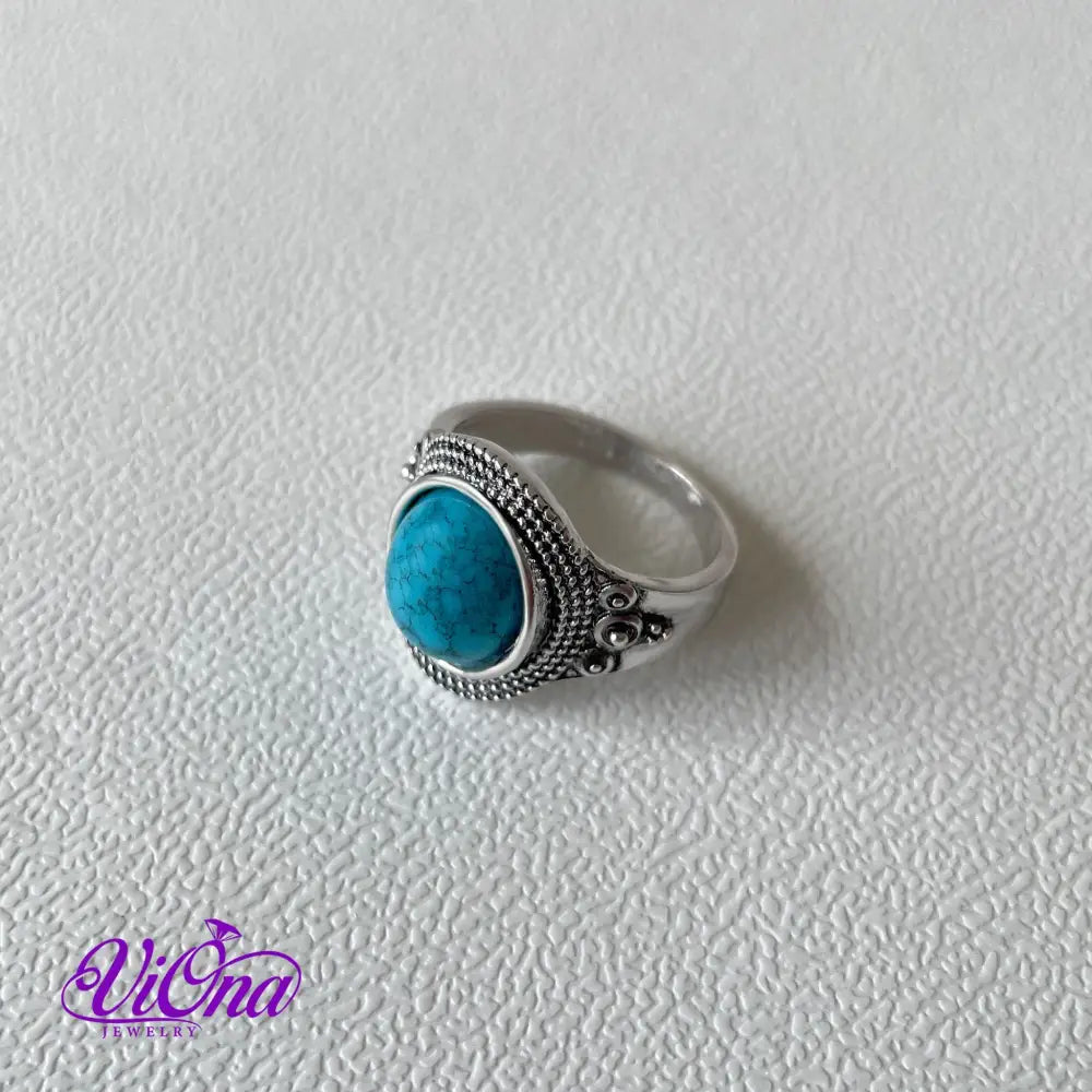 Natural stone turquoise ring with engraved 925 sterling silver