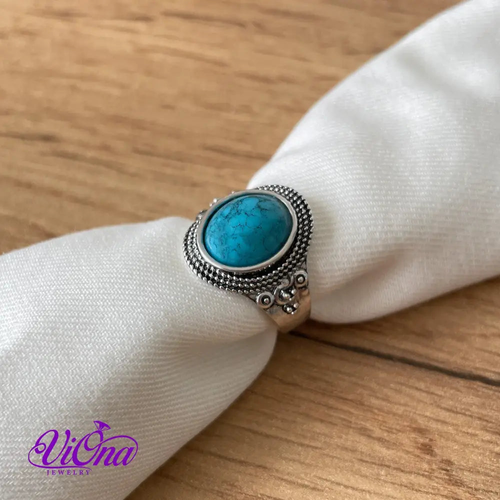 Natural stone turquoise ring with engraved 925 sterling silver