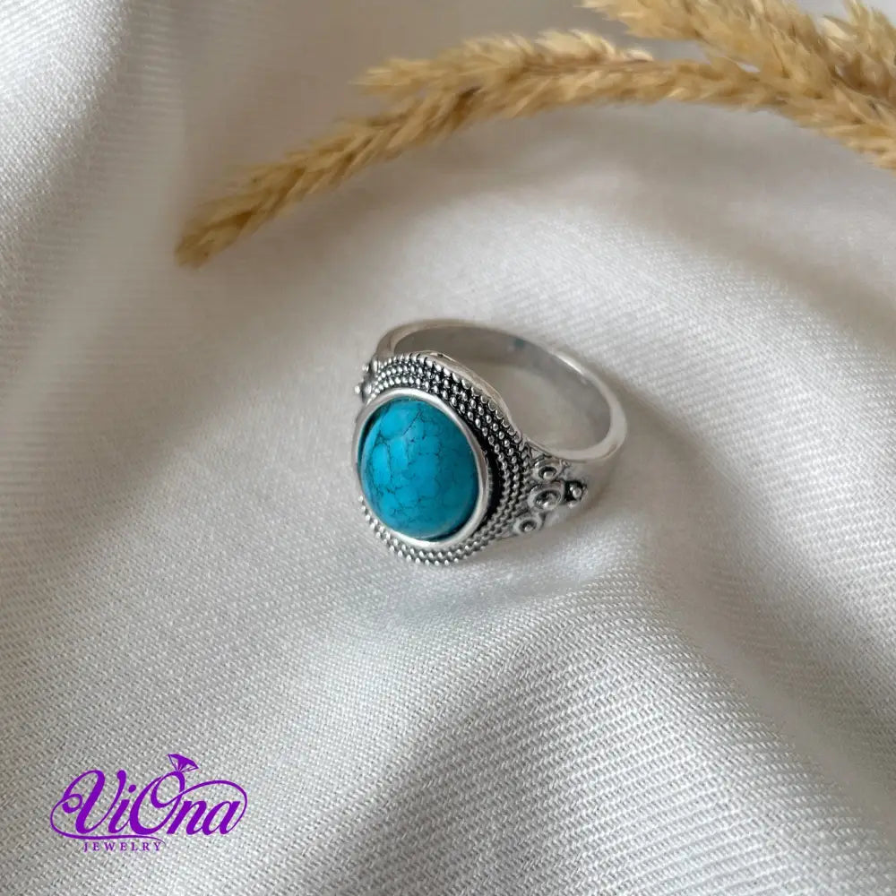 Natural stone turquoise ring with engraved 925 sterling silver