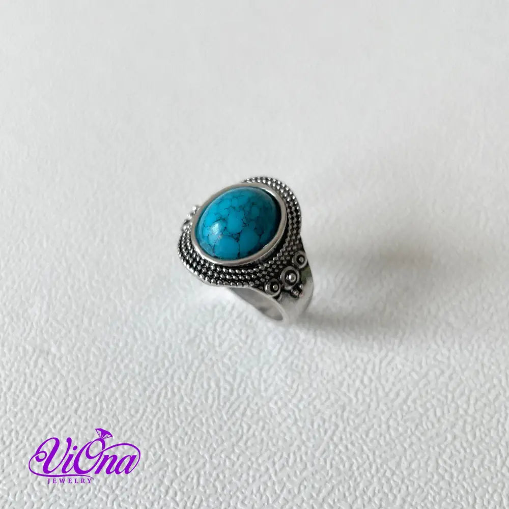 Natural stone turquoise ring with engraved 925 sterling silver