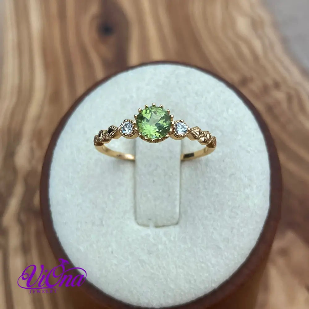 Real Peridot Ring, Round Cut in Gold Plated 925 Sterling Silver with Premium Quality Polished surface plus two CZ side stones