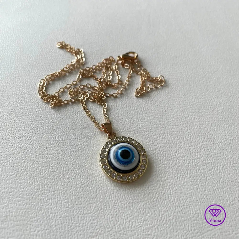 Round Evil Eye necklace, Gold frame with blue pendant