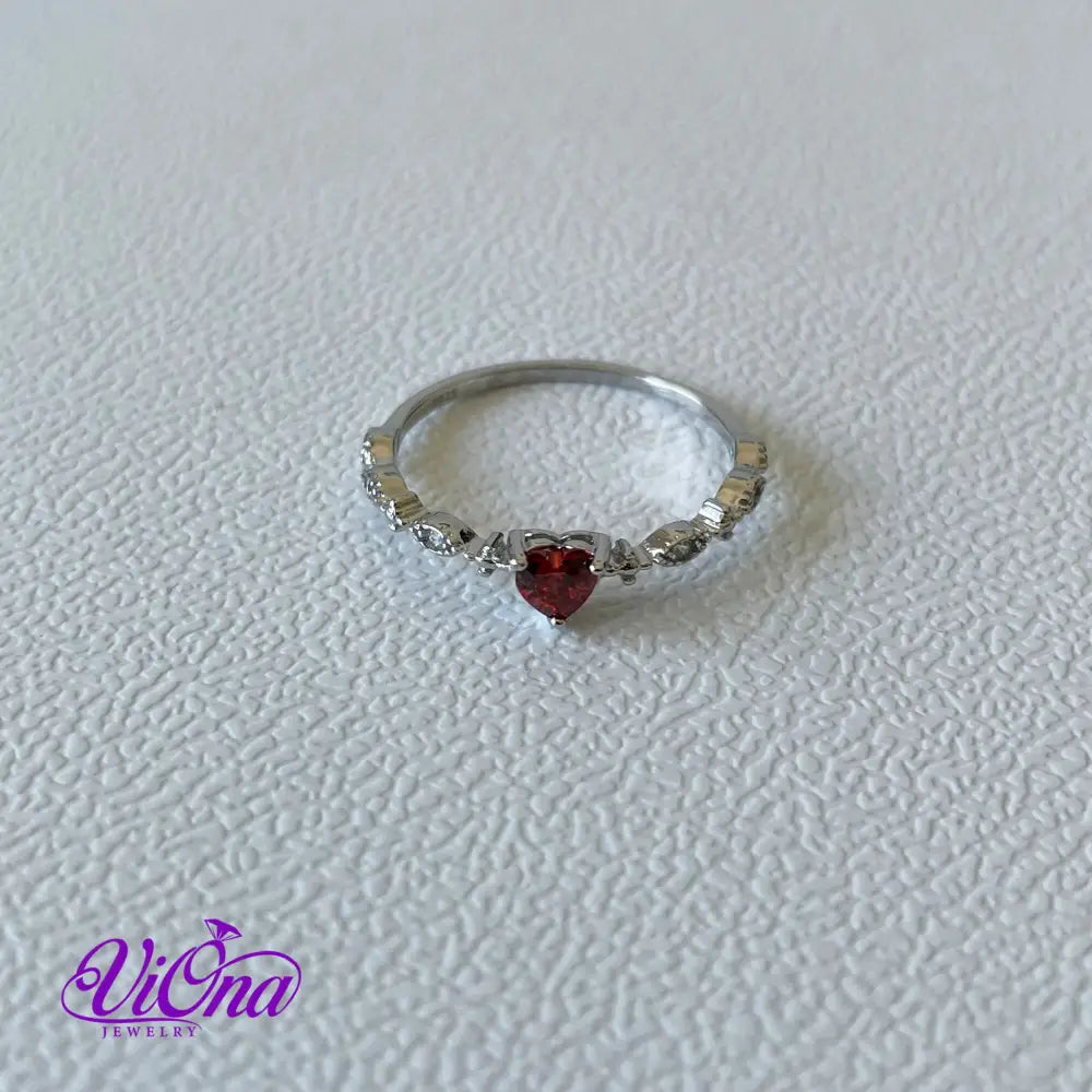 Sterling silver ruby red heart ring with decorated topaz, 925 Stamped