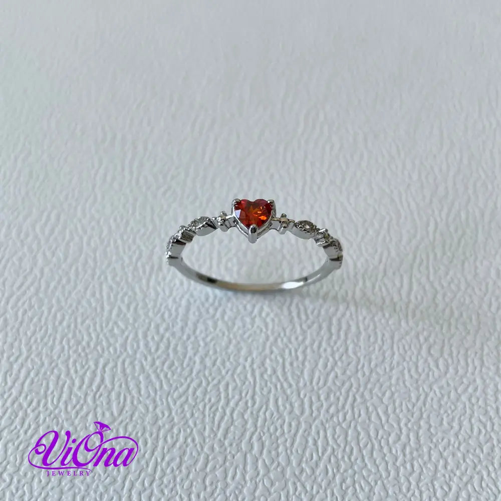 Sterling silver ruby red heart ring with decorated topaz, 925 Stamped