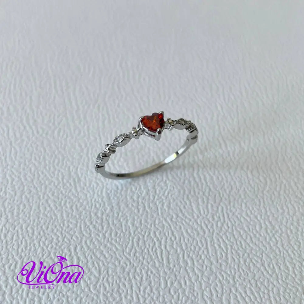 Sterling silver ruby red heart ring with decorated topaz, 925 Stamped