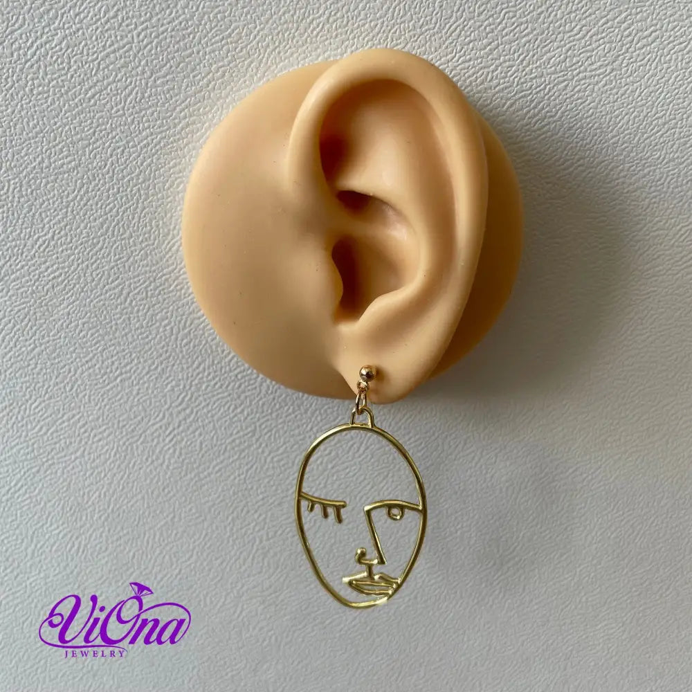 Winking girl, Hollow punk face dangle earrings in gold color