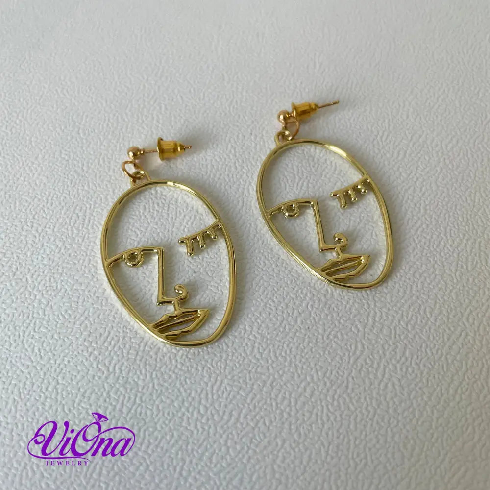 Winking girl, Hollow punk face dangle earrings in gold color