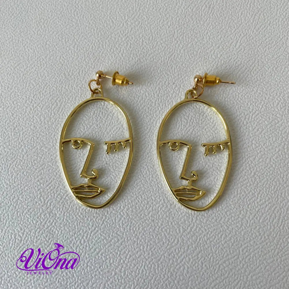 Winking girl, Hollow punk face dangle earrings in gold color